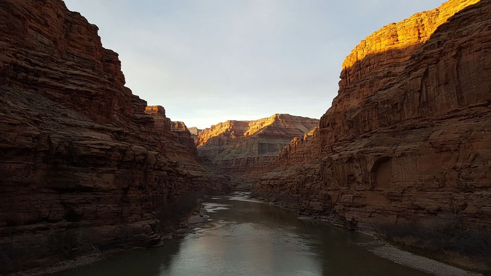 Sandstone walls in the afternoon, with the river at the floor